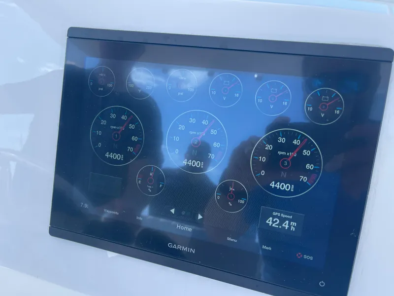 Slide: The Image of Garmin display on 2001 Intrepid 377 Walkaround showing engine metrics and speed. - 15