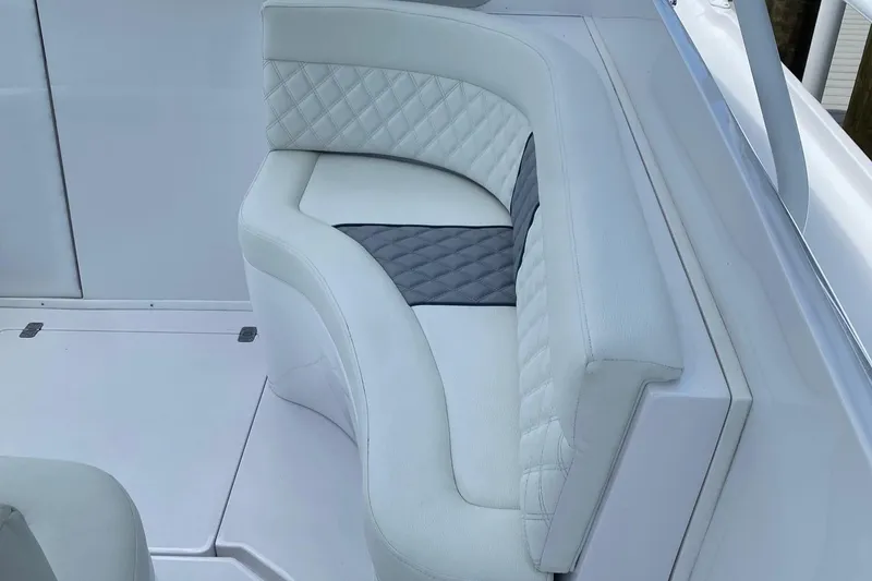 Slide: The Image of Luxurious seating on 2001 Intrepid 377 Walkaround boat with quilted upholstery. - 26