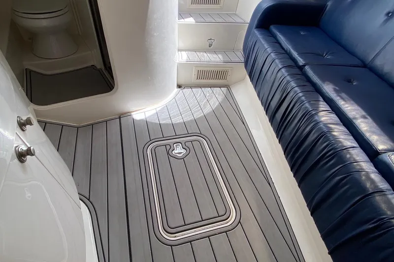 Slide: The Image of 2001 Intrepid 377 Walkaround interior with blue seating and gray flooring. - 29