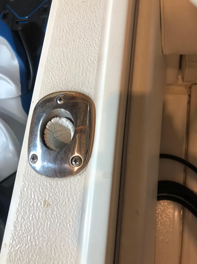 Slide: The Image of 1991 Sea Ray 250 Weekender boat interior detail with metal fitting. - 32
