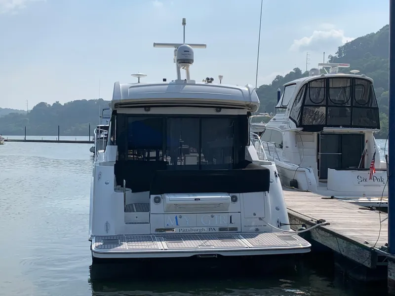 Slide: The Image of 2017 Sea Ray Sundancer 460 docked at a marina. - 4
