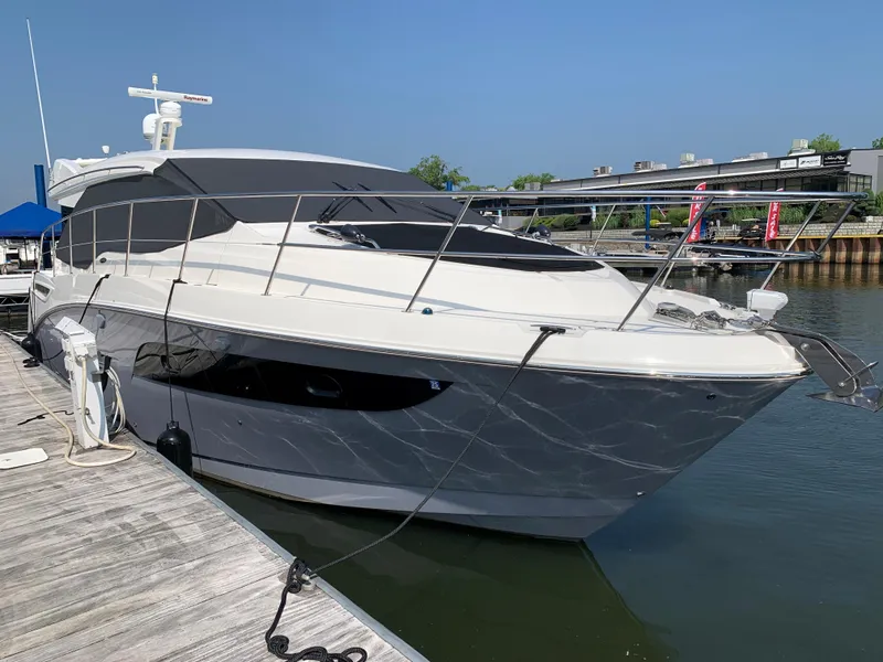 Slide: The Image of 2017 Sea Ray Sundancer 460 yacht docked at marina. - 6