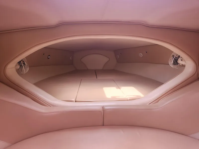 Slide: The Image of Interior cabin of a 2004 Eliminator 380 Eagle boat with beige upholstery. - 7