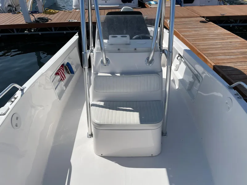 Slide: The Image of Interior view of a 2002 Angler 204CC boat at the dock. - 10