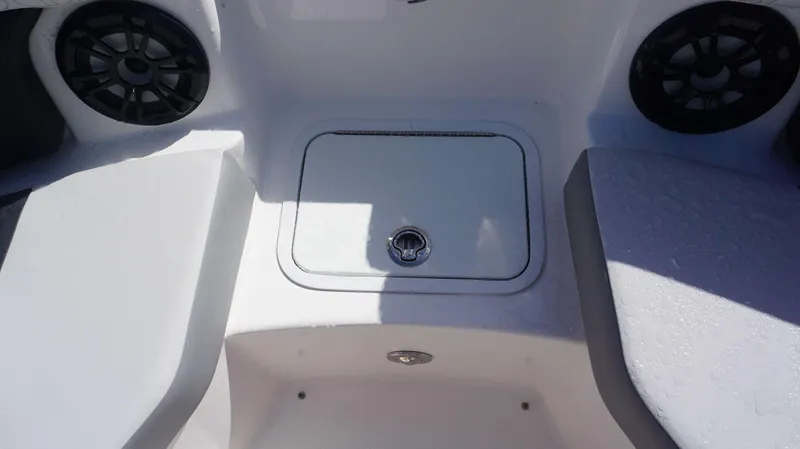 Slide: The Image of 2024 Hurricane 2200 SD boat interior with speakers and storage compartment. - 20