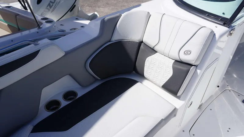 Slide: The Image of 2024 Hurricane 2200 SD boat interior seating with cup holders. - 6