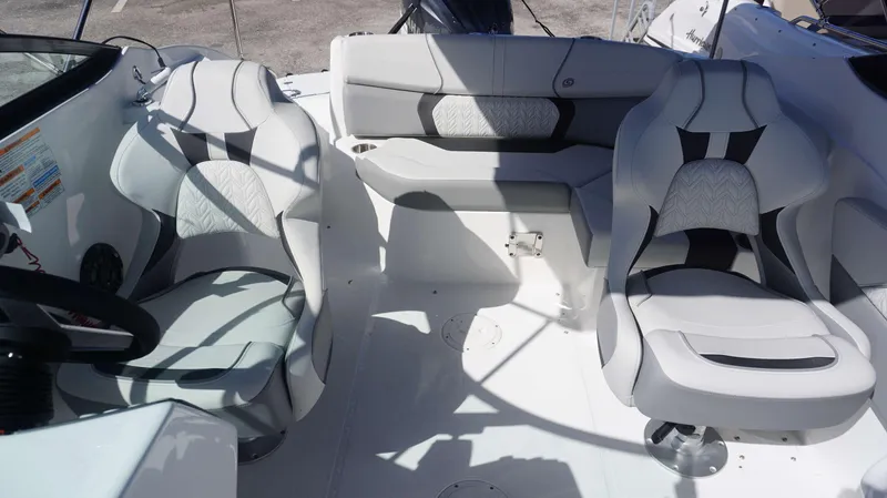 Slide: The Image of 2024 Hurricane 2200 SD boat interior with modern seating and sleek design. - 8