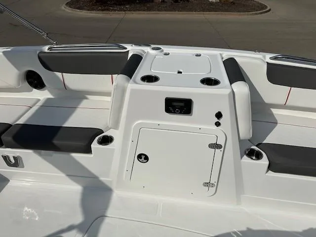 Slide: The Image of 2024 Tahoe 2150 boat interior with seating and storage compartments. - 6