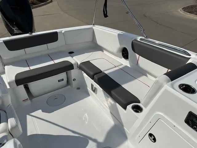 Slide: The Image of 2024 Tahoe 2150 boat interior with sleek seating and modern design. - 7