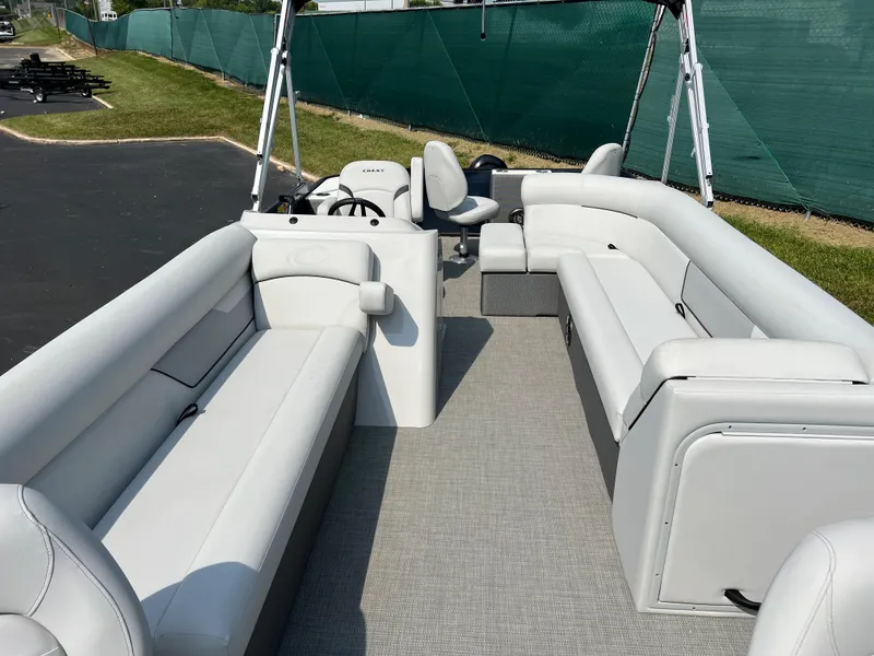 Slide: The Image of 2024 Crest Classic Fish 220 pontoon boat interior with spacious seating and modern design. - 6