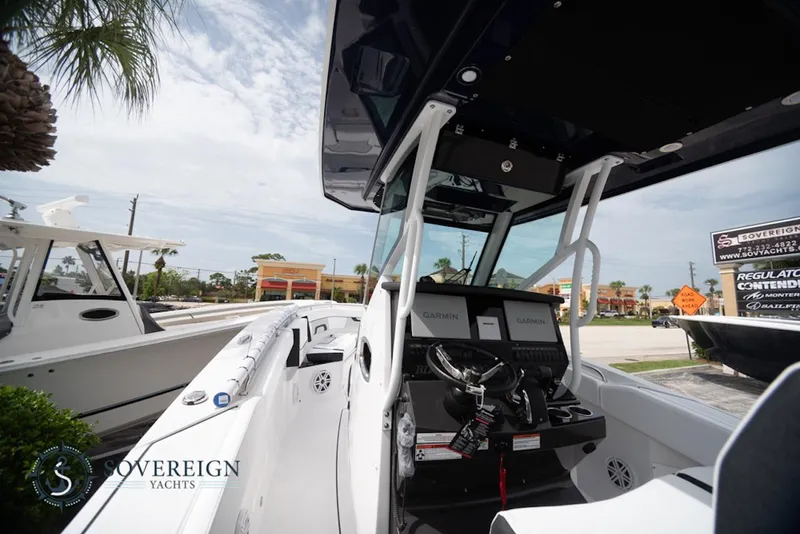 Slide: The Image of 2024 Blackfin 272 CC boat interior with modern dashboard at Sovereign Yachts. - 10