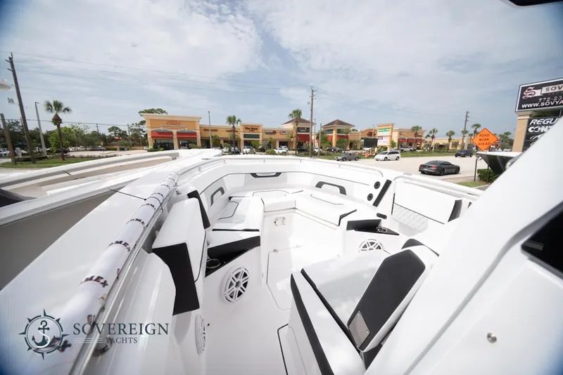 Slide: The Image of 2024 Blackfin 272 CC boat interior with sleek seating and modern design. - 11