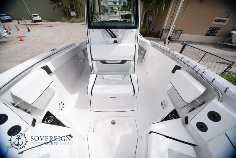 Slide: The Image of 2024 Blackfin 272 CC boat interior with seating and storage, showcased by Sovereign Yachts. - 15
