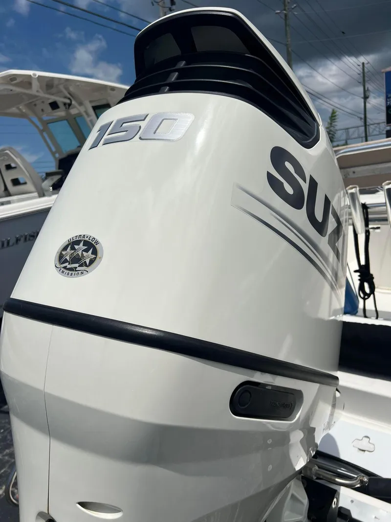 Slide: The Image of 2015 NauticStar 2110 Sport with Suzuki 150 outboard motor. - 13