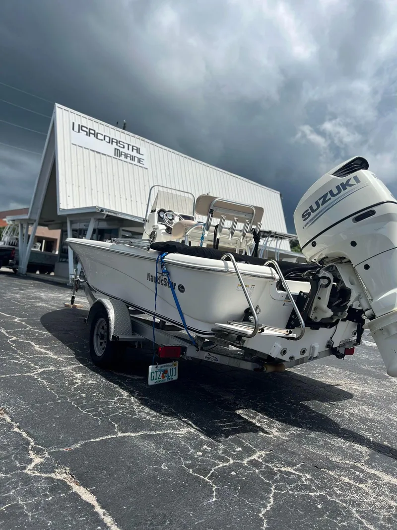 Slide: The Image of 2015 NauticStar 2110 Sport boat with Suzuki engine at US Coastal Marine. - 3