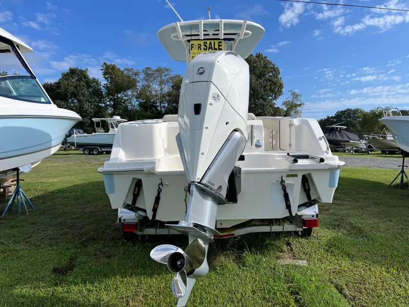 Slide: The Image of 2024 Boston Whaler 230 Outrage boat for sale, rear view with outboard motor. - 34