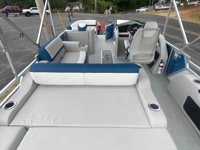 Slide: The Image of 2024 Avalon LSZ 2385 VRL pontoon boat interior with spacious seating and modern design. - 15