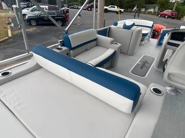 Slide: The Image of 2024 Avalon LSZ 2385 VRL pontoon boat with spacious seating and modern design. - 18