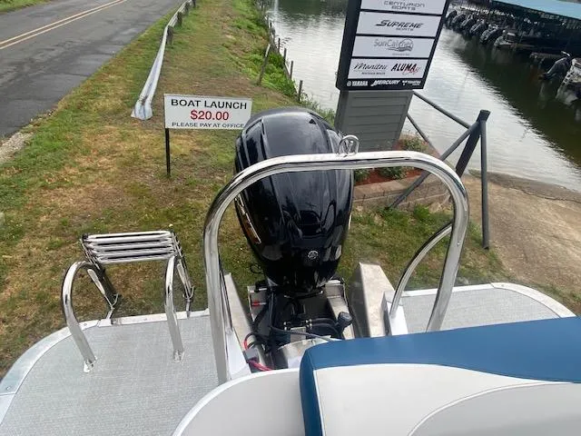 Slide: The Image of 2024 Avalon LSZ 2385 VRL boat at launch site with $20 fee sign. - 19