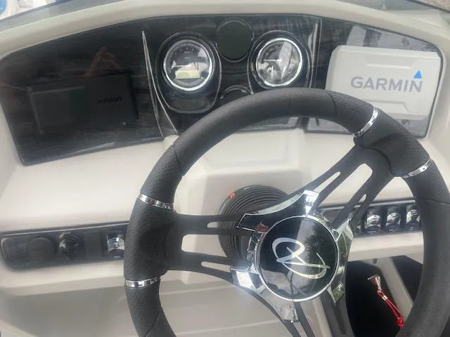 Slide: The Image of 2024 Avalon LSZ 2385 VRL dashboard with Garmin navigation system and steering wheel. - 25