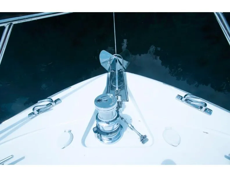 Slide: The Image of Bow of 2006 Hatteras 64 Motor Yacht with anchor and winch system. - 18