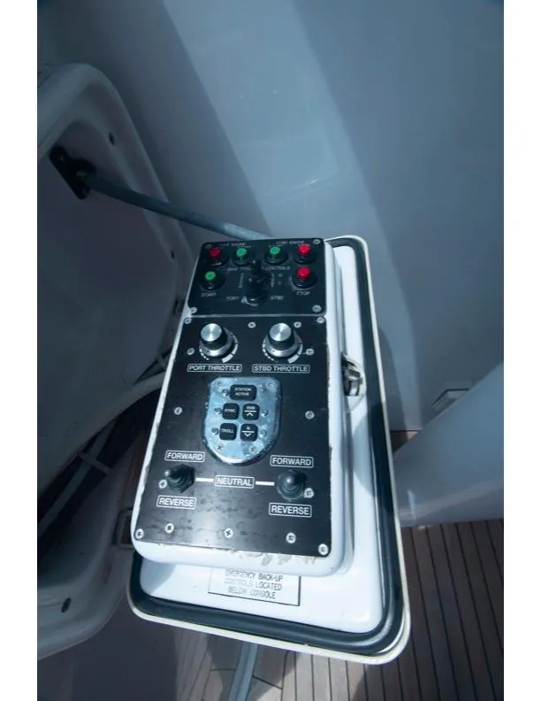 Slide: The Image of Control panel of 2006 Hatteras 64 Motor Yacht, featuring navigation and engine controls. - 37