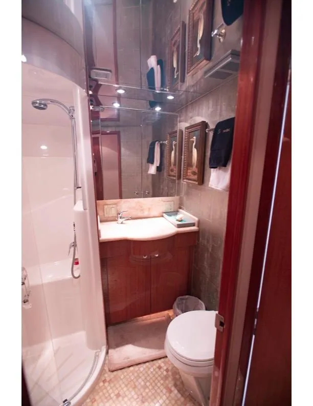 Slide: The Image of Luxurious bathroom in 2006 Hatteras 64 Motor Yacht with shower and elegant fixtures. - 48