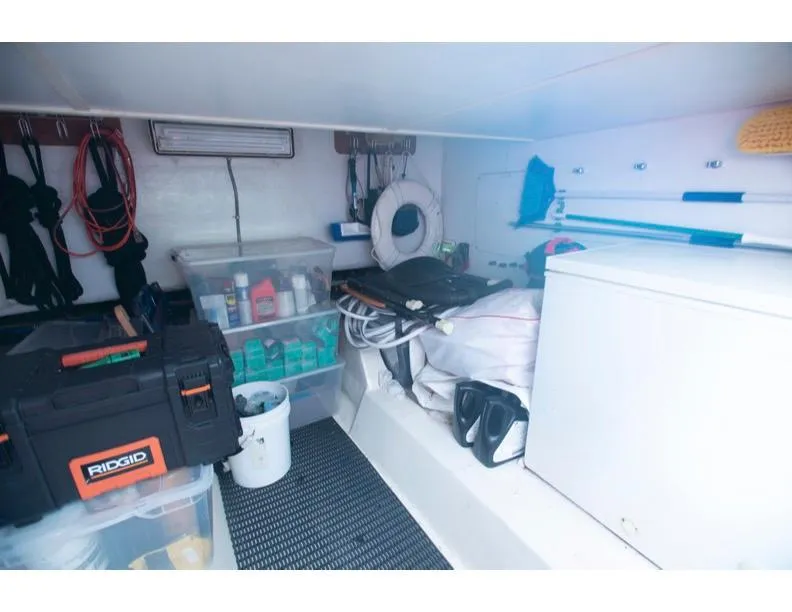 Slide: The Image of Storage area in 2006 Hatteras 64 Motor Yacht with tools and equipment. - 49