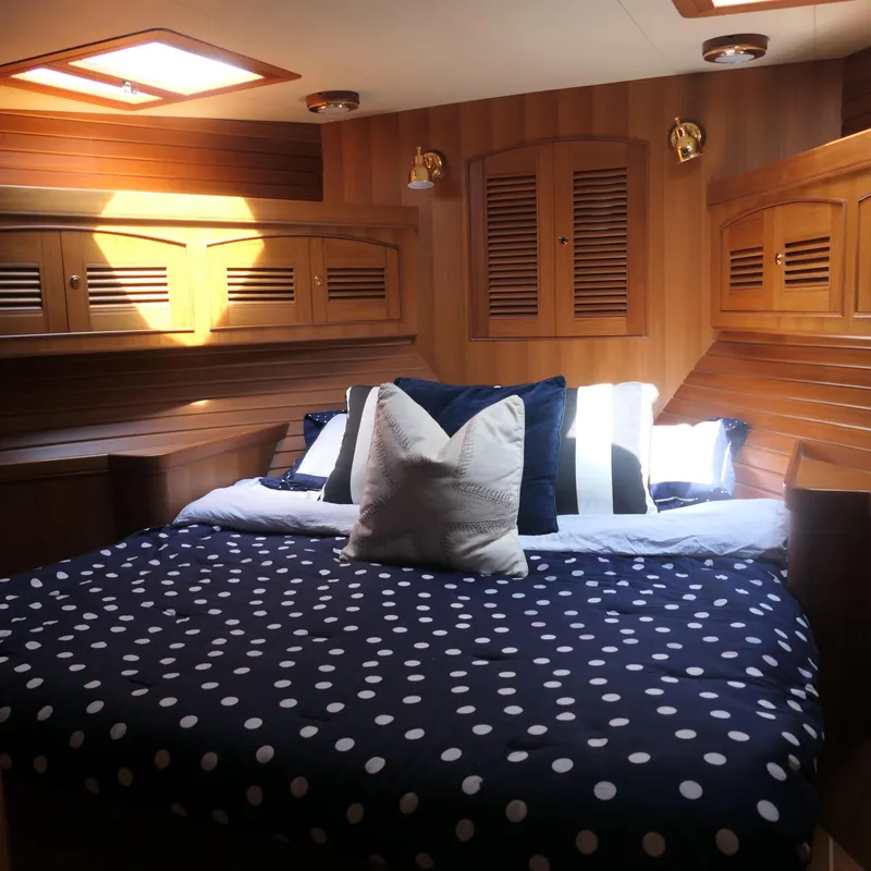Slide: The Image of Luxurious cabin interior of 2008 Marlow 53 C Explorer yacht with cozy bedding. - 11