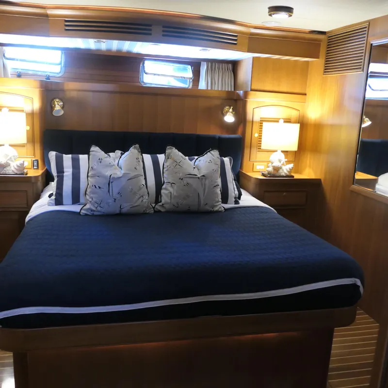Slide: The Image of Luxurious bedroom interior of 2008 Marlow 53 C Explorer yacht with elegant bedding. - 12