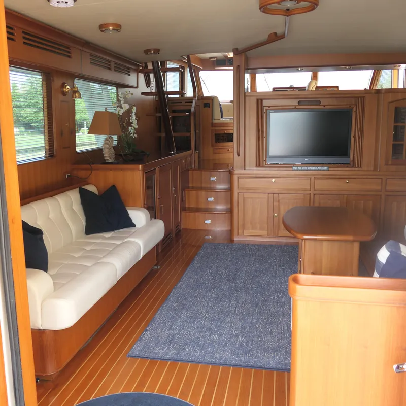 Slide: The Image of Luxurious interior of 2008 Marlow 53 C Explorer yacht with wood finish and modern amenities. - 2