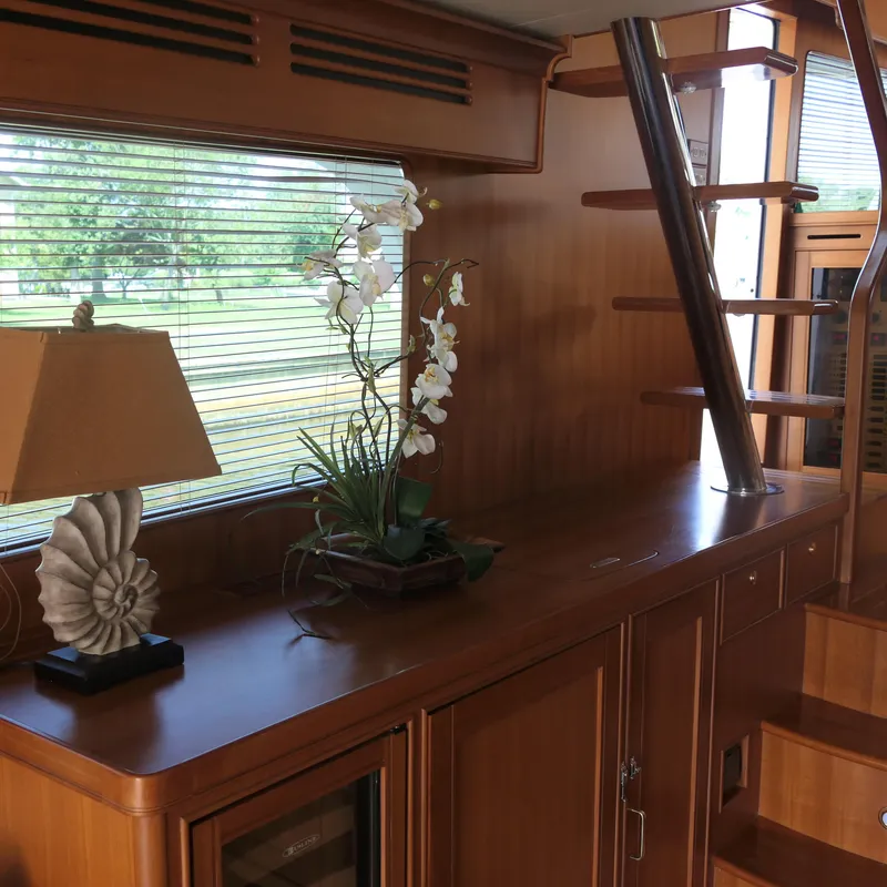 Slide: The Image of Interior of 2008 Marlow 53 C Explorer yacht with wooden decor and staircase. - 5