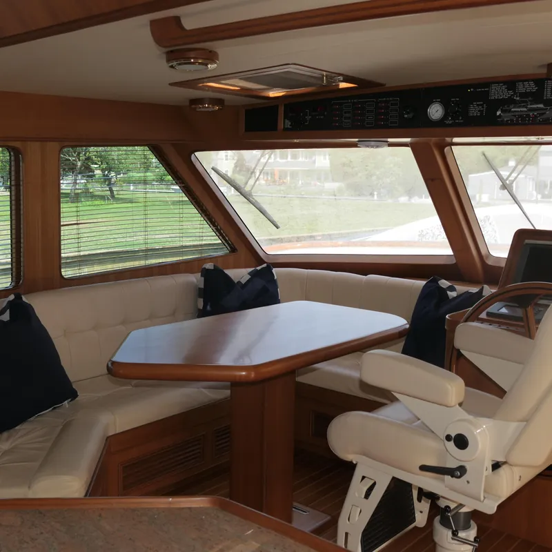 Slide: The Image of Interior of 2008 Marlow 53 C Explorer yacht with seating and helm. - 8