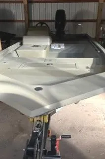 Slide: The Image of 2024 Tracker Grizzly 1648 SC boat in storage. - 2