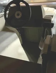 Slide: The Image of 2024 Tracker Grizzly 1648 SC boat interior with steering wheel. - 3