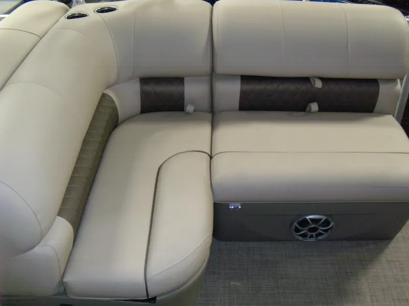 Slide: The Image of 2024 Sun Tracker Party Barge 22 RF XP3 beige and brown cushioned seating. - 4