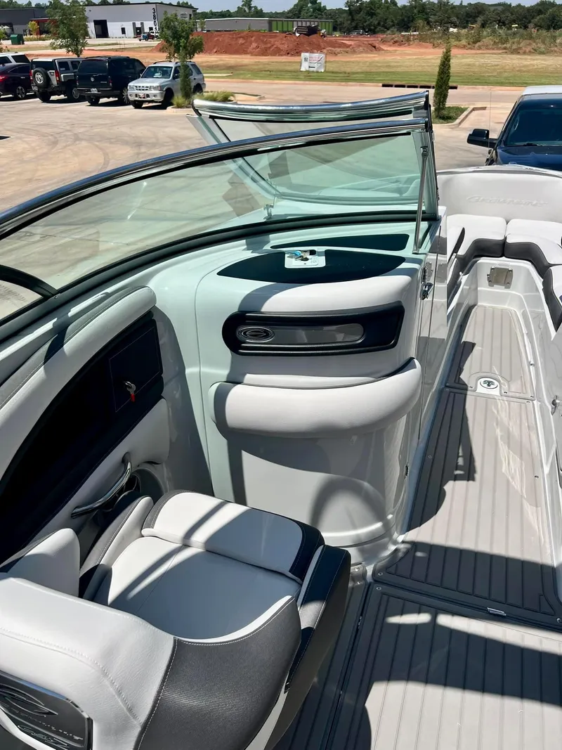 Slide: The Image of 2024 Crownline 270SS boat interior with sleek seating and modern design. - 14