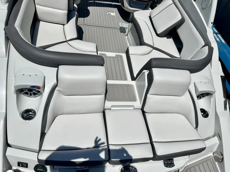 Slide: The Image of 2024 Crownline 270SS boat interior with luxurious seating and modern design. - 23