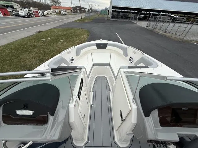 Slide: The Image of 2024 Chaparral 21 SSi boat interior with open bow seating and modern design. - 13