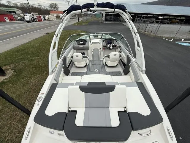 Slide: The Image of 2024 Chaparral 21 SSi boat interior with sleek seating and modern design. - 7