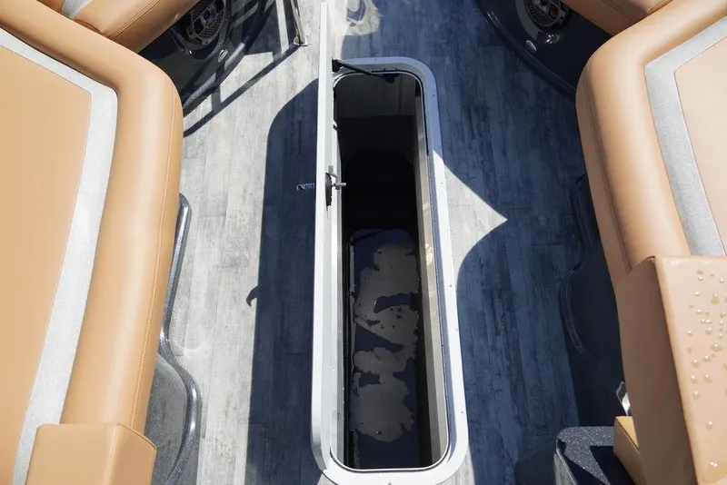 Slide: The Image of 2024 Crest Savannah 250 SLSC CP3 boat interior storage compartment. - 6