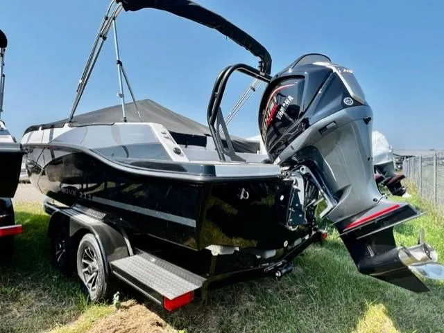 The Image of 2024 Starcraft SVX211 boat with outboard motor on trailer. - 0