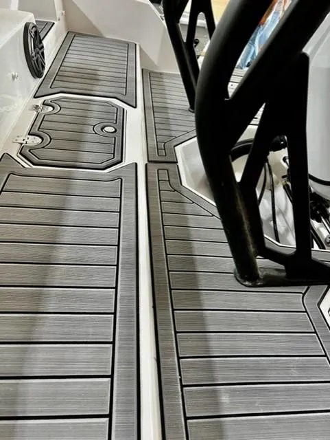 Slide: The Image of 2024 Starcraft SVX211 boat deck with sleek, modern design and durable flooring. - 3