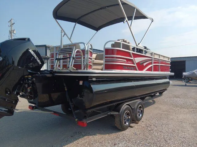 Slide: The Image of 2023 Ranger Reata 223C pontoon boat with canopy and Mercury outboard motor. - 47