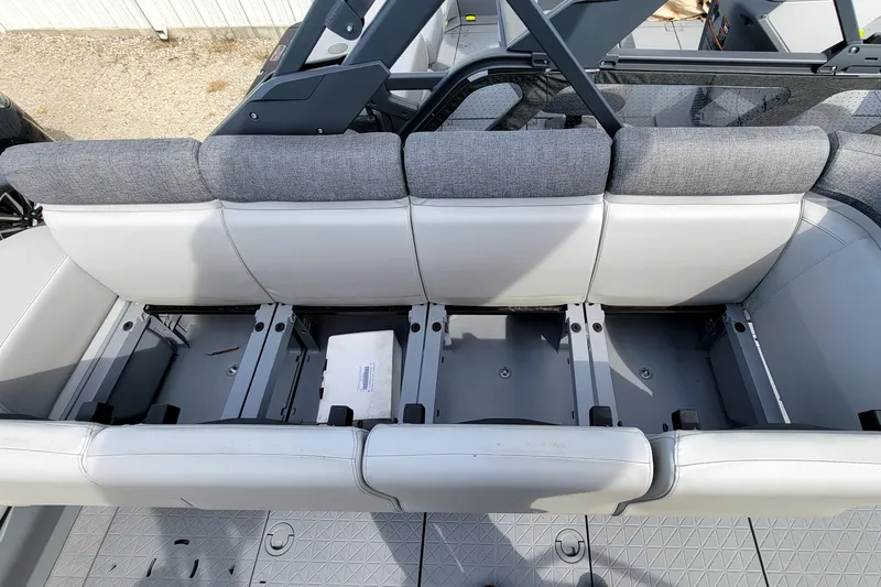 Slide: The Image of 2023 Sea-Doo Switch Sport 21 interior seating and storage compartments. - 5