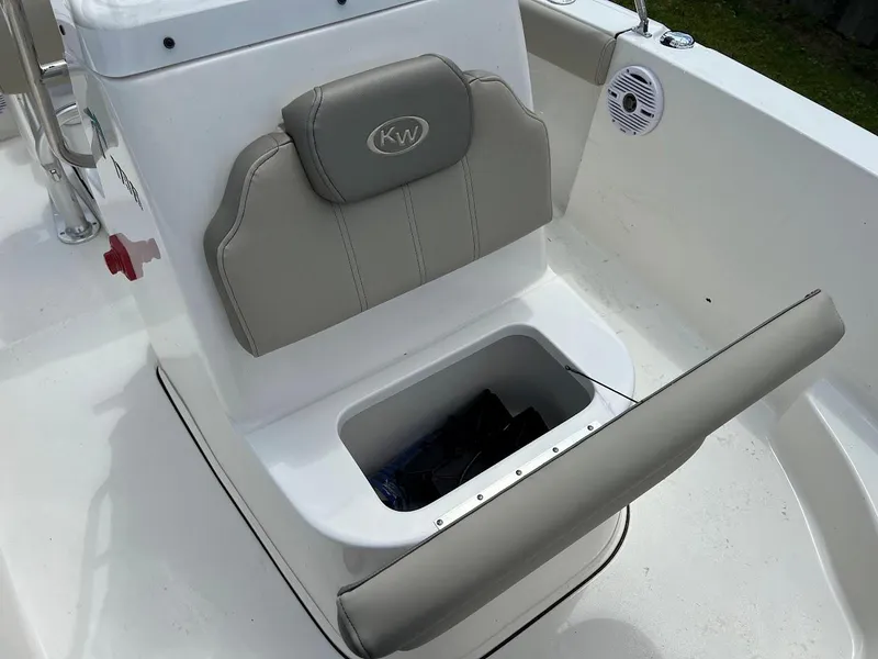 Slide: The Image of 2024 Key West 179 FS boat seat with storage compartment. - 20