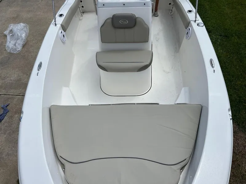 Slide: The Image of 2024 Key West 179 FS boat interior with cushioned seating. - 22