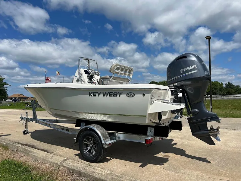 Slide: The Image of 2024 Key West 179 FS boat on trailer with Yamaha outboard motor. - 5