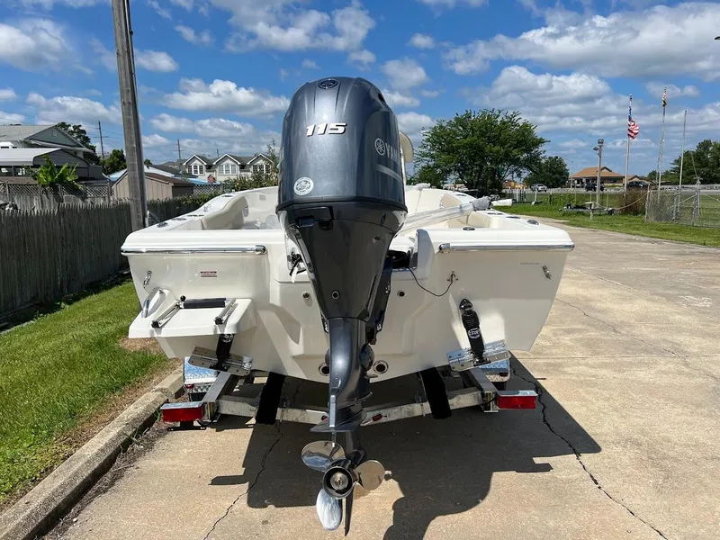 Slide: The Image of 2024 Key West 179 FS boat with Yamaha 115 outboard motor on trailer. - 7