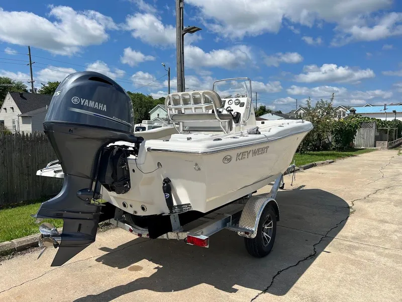 Slide: The Image of 2024 Key West 179 FS boat with Yamaha engine on trailer. - 8